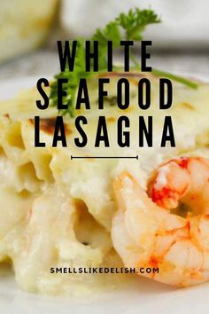 white seafood lasagna with shrimp and parsley garnish on the side