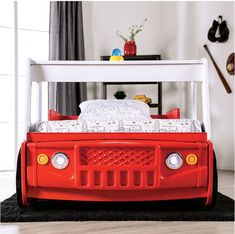 a child's bed made out of an old firetruck is shown in this image