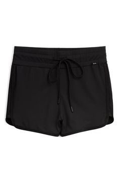 You will move with ease from land to sea in these stretch-enhanced swim shorts topped with a high waist. 3 1/2" inseam   Lined   80% recycled polyester; 20% spandex   Hand wash, line dry   Imported Lightweight Black Summer Bottoms, Lightweight Black Bottoms For Summer, Summer Workout Shorts Made Of Recycled Polyester, Lightweight Recycled Polyester Short Bottoms, Lightweight Black Activewear For Summer, Versatile Compressive Shorts For Summer, Black Nylon Shorts For Beach Season, Compressive Summer Activewear With Elastic Waistband, Summer Compressive Activewear With Elastic Waistband