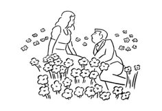 a man kneeling down next to a woman in front of flowers