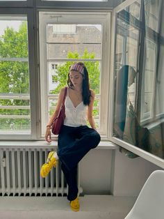 window sill photo inspo . berlin outfit inspo . candid outfit picture . djerf avenue headband dupe . onitsuka tiger yellow mexico 66 outfit inspo . dark blue jeans . red vintage bag . hair inspo . copenhagan style outfit inspo . copenhagan aesthetic . Mexico 66 Outfit, Onitsuka Tiger Yellow, Outfit Inspo Dark, Blue Sneakers Outfit, Berlin Outfit, Dark Blue Jeans Outfit