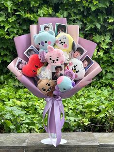 a bunch of stuffed animals in a bouquet