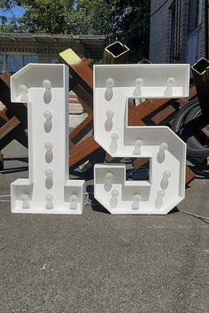 the letters are made out of white plastic