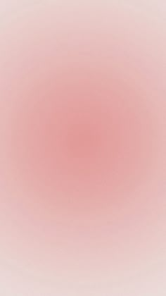 a pink and white background with an oval shape in the center that appears to be blurry