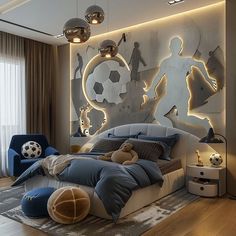 a bedroom with a soccer theme on the wall