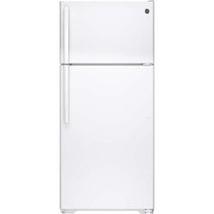 a white refrigerator freezer sitting on top of a counter