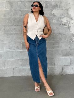 The Rolla's Chicago midi denim skirt will be your new go-to all year long! Featuring a high-rise, a-line cut, front-slit, and button-fly. This skirt is crafted with a high-quality, rigid denim, vintage logo buttons, and a mid blue wash with contrasting tobacco stitching. Material 79% Cotton, 21% Elastane. Fit Info Fits true to size. Measures 33.5" in length. Model in image 3 is 5’7” and wearing a true to size 25.Model in the image 4 & 5 is 5’10” and is wearing a true to size 27. Model in images 6-7 is 5’5” and is wearing a true to size 24. Model in images 8-9 is 5'4" and is wearing a true to size 27. Midi Denim Skirt, Jean Skirt Outfits, Maxi Skirts Summer, Fashion Notes, Structured Top, Midi Skirt Outfit, Cool Girl Style