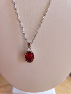 Classic Red Jewelry With Lab-created Ruby, Classic Red Lab-created Ruby Jewelry, Elegant Ruby Jewelry With Polished Finish, Classic Red Ruby Jewelry, Classic Red Birthstone Jewelry, Formal Jewelry Pendant For Valentine's Day, Dazzling Oval Jewelry For Formal Occasions, Formal Pendant Jewelry For Valentine's Day, Elegant Red Birthstone Jewelry