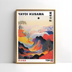 a framed poster with the words yayoi kusama in japanese on it