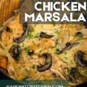 chicken marsala in a skillet with mushrooms and parmesan cheese on top