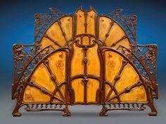 an ornately designed wooden bed frame