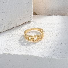 Make a bold statement with 14k real yellow gold Cuban Chain Statement Ring. This striking piece is perfect for those who seek for a conversation starter jewelry. Gold Chain Link Ring Made Of Metal, Gold Metal Chain Link Ring, Durable Metal Chain Ring, Trendy Chain Rings In Metal, Trendy Metal Chain Rings, Trendy Adjustable Chain Open Ring, Trendy Adjustable Open Chain Ring, Metal Chain Ring With Gold Link Chain, Trendy Chain Link Chain Ring As Gift