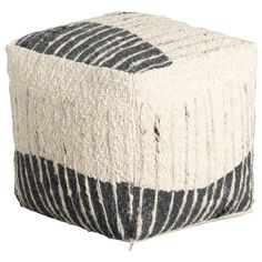 a black and white striped poufce on a white background