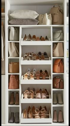 a white closet filled with lots of different types of shoes and purses on shelves