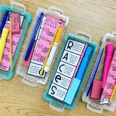 three plastic containers filled with pens and writing paper next to each other on a wooden table