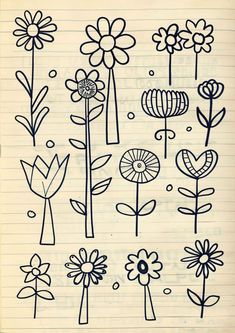 an open notebook with flowers drawn on it