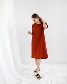 Red Linen Dress, Loose Linen Dress, Linen ClothingD E S C R I P T I O N:- Relaxed loose fit- Straight silhouette- Crew (round) neck- Dolman style sleeves- Short sleeve- Two hidden side pockets- Midi long dress, below the knee length- Belt (optional, it can be selected via Size)D E T A I L S- Sizes: XS - XXL- Color: Mustard, Dusty peach, Salmon, Terracotta, Burgundy red, Cacao, Pine green, Chartreuse green, Milky white, Dusty Lavender, Light Grey, Mint, Sky blue, Blue, Deep blue, Striped grey, Gr Red Relaxed Fit Dress For Spring, Red Linen Short Sleeve Dress For Summer, Red Short Sleeve Linen Dress For Summer, Red Shift Midi Dress Knee-length, Red Shift Dress With Short Sleeves, Red Knee-length Shift Dress, Red Shift Knee-length Dress, Red Shift Dress, Knee-length, Dress Below The Knee