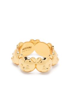 Teddy Bear ring from MOSCHINO featuring gold-tone, brass, signature Teddy Bear motif and engraved logo. | Moschino Teddy Bear ring Gold Rings Thick, Teddy Bear Jewelry, Teddy Bear Accessories, Baddie Rings, Moschino Jewelry, Teddy Bear Ring, Moschino Bear, Bear Ring, Moschino Teddy Bear