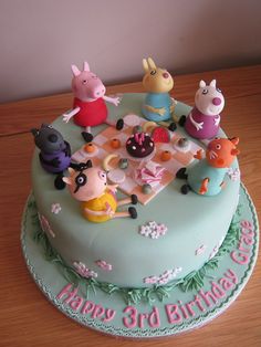 a birthday cake with pepo and friends on it