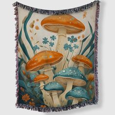 a tapestry with mushrooms and flowers on it