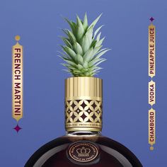 a pineapple sitting on top of a bottle of liquor