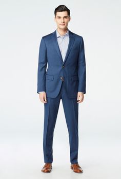 Classic, versatile and reliable - the Hemsworth is your tried-and-true deep blue suit. This solid-colored number in pure premium wool stands up to whatever the daily hustle throws at you. Fitted Wool Suit In Solid Color, Fitted Solid Wool Suit, Tailored Blue Wool Suit, Tailored Solid Wool Suit, Tailored Wool Suits In Solid Color, Timeless Blue Suit In Suiting Fabric, Tailored Timeless Blue Suit, Timeless Tailored Blue Suit, Blue Wool Three-piece Suit With Notch Lapel