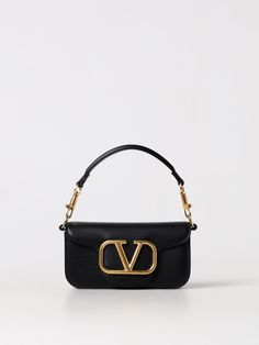 Find VALENTINO Mini Bag on Editorialist. Valentino Garavani mini bag with top handle and detachable chain strap. The bag features a gold tone logo and a flap open closure. It can be hand carried, worn on the shoulder or worn crossbody. Classic Evening Flap Bag With Logo Hardware, Elegant Formal Flap Bag With Logo Hardware, Chic Formal Flap Bag With Logo Hardware, Chic Rectangular Flap Bag With Logo Hardware, Chic Evening Flap Bag With Logo Hardware, Elegant Flap Bag With Logo Hardware For Everyday Use, Elegant Everyday Flap Bag With Logo Hardware, Chic Top Handle Satchel With Logo Hardware, Formal Rectangular Flap Bag With Logo Hardware