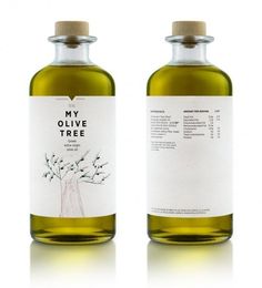 two bottles of olive tree oil on a white background