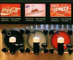 a row of vending machines filled with drinks