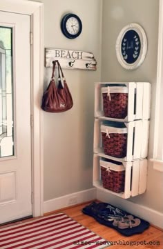 a white door and some baskets on the floor