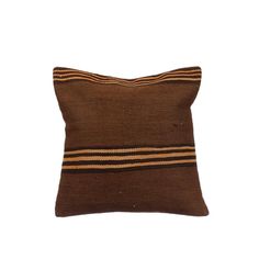 a brown pillow with stripes on the front and back, sitting against a white background