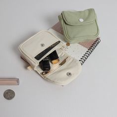 Mini Headphone Bag Portable Cash Wallet New Hand Bag Headset   Color: beige, green Suitable for: change, lipstick, headphones, etc Type: Zero wallet Material: Canvas Size: 10 * 8 * 3cm Product includes: 1 PC * Coin Purse Notice: 1,Actual color may be slightly different from the image due to different monitor and light effect. 2,Please allow 1-2cm deviation due to manual measurement. * Please make payment asap, then we can arrange shipment for you asap * Item will be sent within 1-2 days of payment verification. * We appreciate your patience and allow sufficient time for delivery. Please feel free to contact us if you don't receive your package ！ * We will carefully test every item before shipment.The quality is guaranteed!  * Any questions, please contact us via eBay message, In our workin Books Journal, Dream Bag, Cash Wallet, Purse Essentials, Pad Bag, Bag Designs, Handbag Outfit, Key Pouch, Sanitary Pads