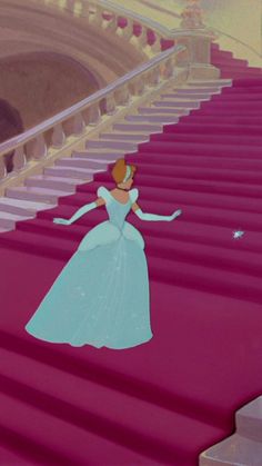 princess in blue dress walking down the stairs