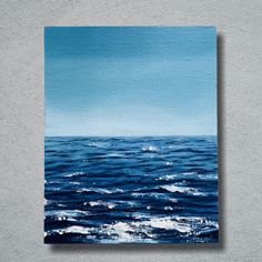 an ocean scene with blue water and white foam on the surface, painted in acrylic paint