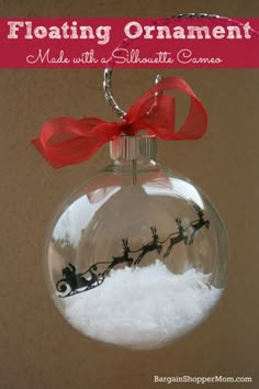 a christmas ornament with santa's sleigh on it