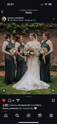 a group of women standing next to each other in front of a brick wall holding bouquets