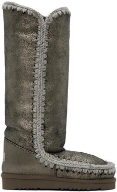 Mou.Gray 40 Shearling Boots.Handcrafted knee-high sheepskin suede boots in metallic gray. Hand-crocheted wool blanket stitching throughout..· Moc toe.· Logo patch at heel counter.· Shearling lining.· Treaded EVA foam rubber sole.Supplier color: Dust black.Upper: sheepskin. Sole: rubber..Made in China..232326F115000 Mou Shoes, Color Dust, Shearling Boots, Blanket Stitch, Eva Foam, Wool Blanket, Suede Boots, Boot Shoes Women, Hand Crochet