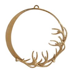 a gold necklace with antlers hanging from it