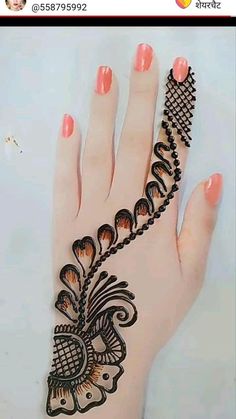 the hand is decorated with intricate designs