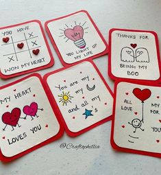 four valentine's day cards with hearts and words on them, all written in different languages