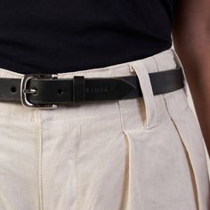 A closet staple, made with quality and timelessness, this vegetable tanned black leather belt features a nickel buckle. It's versatility and minimal design lends it to being worn every day with any outfit. 1" wide Suggested Sizing: XXS Size 24-26, XS Size 26-28, Small Size 28-30, Medium Size 30 - 32, Extra Large Size 34-36 (Waist measurement in inches) Made in Argentina Timeless Black Belt, Chic Black Leather Belt, Elegant Black Leather Belt, Black Fitted Modern Belt, Edgy Black Fitted Belt, Black Belt Outfit, Tan Leather Belt, Masculine Fashion, Modern Accessories