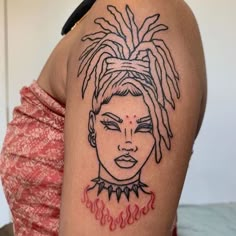 a woman's arm with a drawing of a girl wearing dreadlocks on it