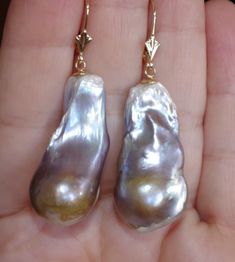 14K Large  Teardrop  Mabe  Keshi Baroque Pearl  Leverback Earrings Being offered is a fabulous   14K GOLD  47 MM Large  White  Creamy  Brown  Cultured  Mabe Teradrops These are Large  Mabe  Pearl leverback Earrings  33 mm X 15 mm  Cultured  Mabe Pearls 15.5  GRAMS /   78 CARATS Noticable Size Drops  47  MM Top  TO Bottom  including ear wires Please see photos. It is in an excellent vintage condition.  You will be very pleased. Pearl Earring Jacket, Large Pearl Earrings, Mabe Pearl, Earring Jackets, Leverback Earrings, Pearl Studs, Tear Drop, Baroque Pearls, Privacy Policy