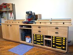 a workbench with many drawers and tools