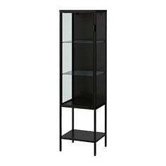 a tall black shelf with glass doors and shelves on the bottom, in front of a white background