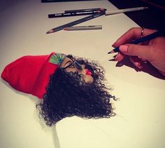 a doll is being made with pencils and crayons