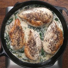 some chicken is cooking in a skillet