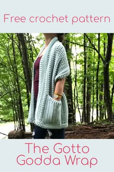 a woman is standing in the woods wearing a crochet sweater and holding a handbag