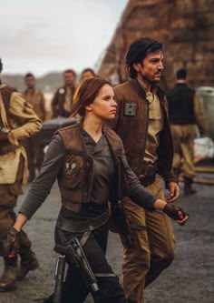 the star wars characters are walking together