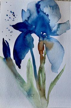 an image of a blue flower painted with watercolors on the front of a facebook page